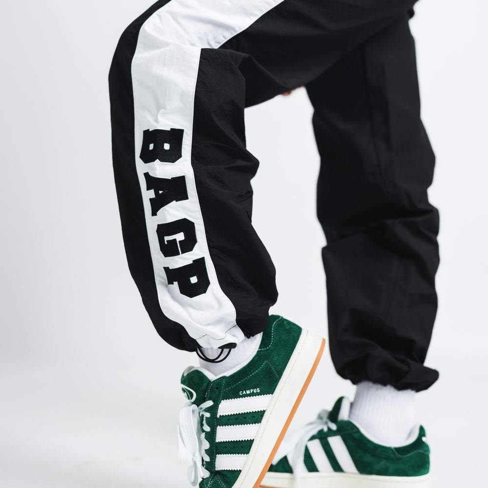 
                      
                        University Collection Track Pant
                      
                    