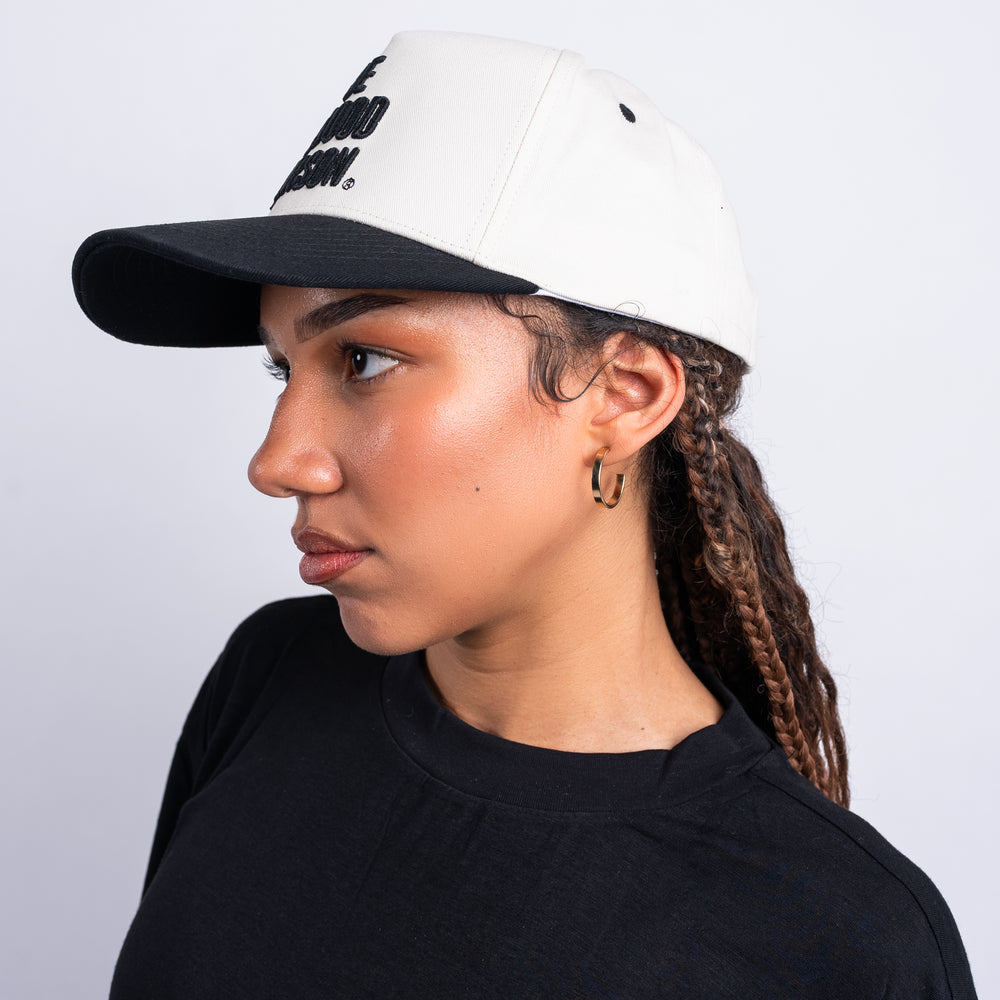 
                      
                        Signature Snapback Hat - Cream/Black
                      
                    