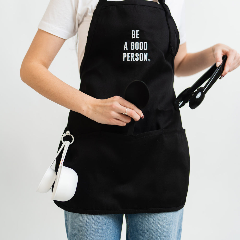 
                      
                        Signature Black Apron
                      
                    