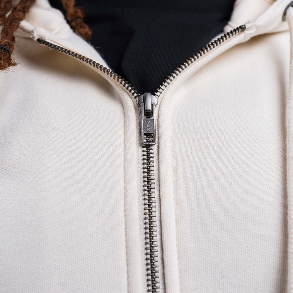 
                      
                        Saint Script Zip Up - Cream
                      
                    