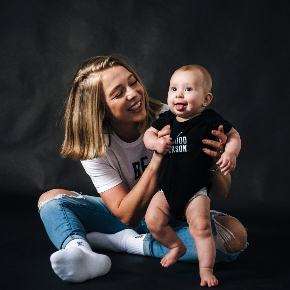 
                      
                        Signature Baby Onesie - Black
                      
                    